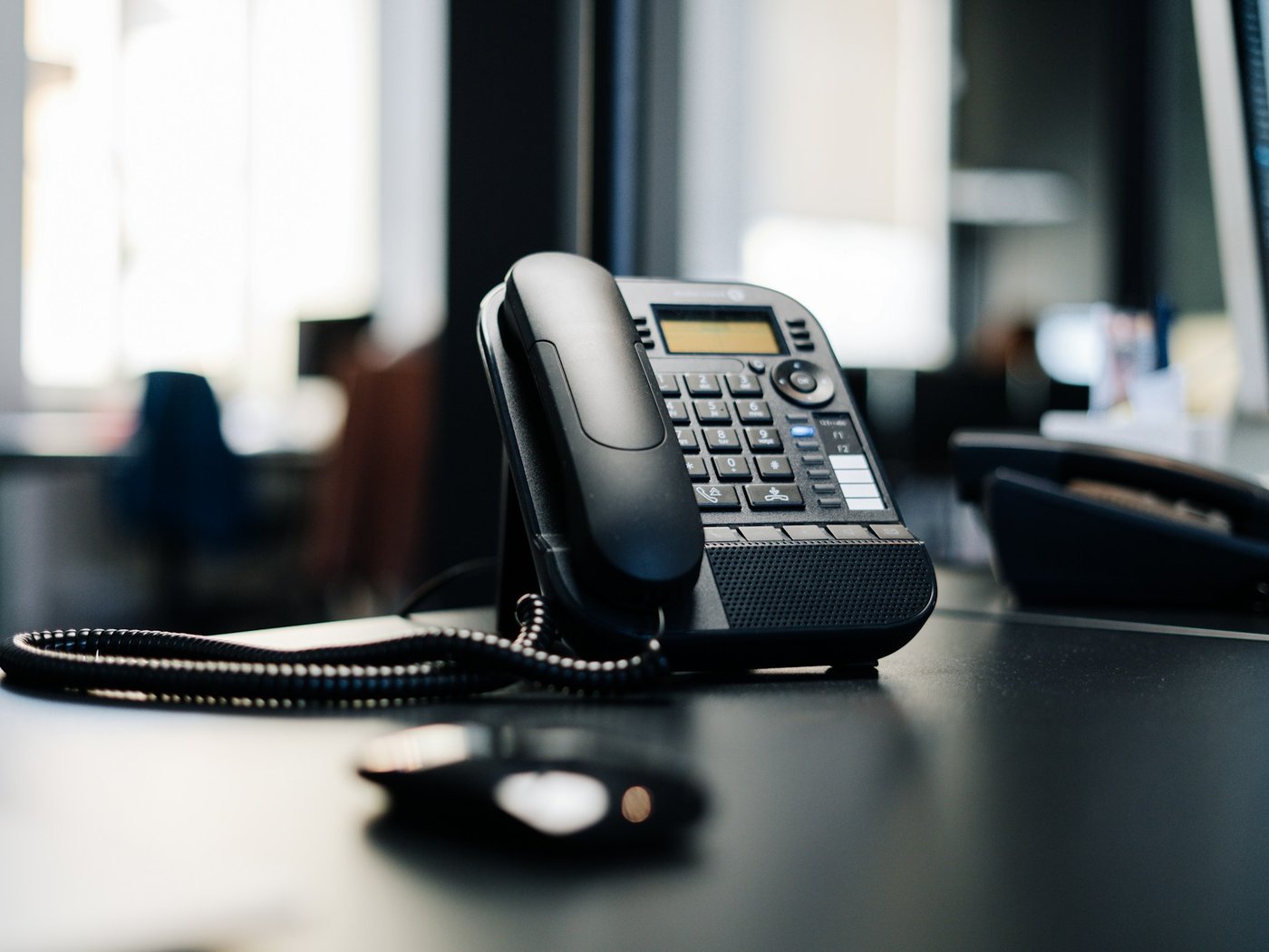 VoIP desk phone in a business office
