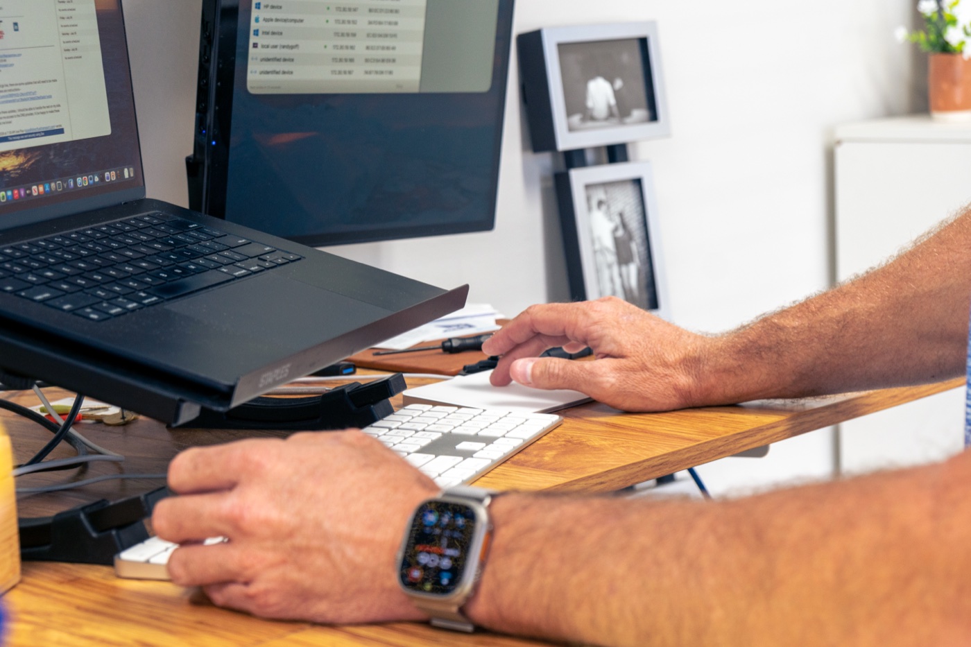 LRG Technology specialist reviewing a live network device inventory at a Gulf Coast workstation